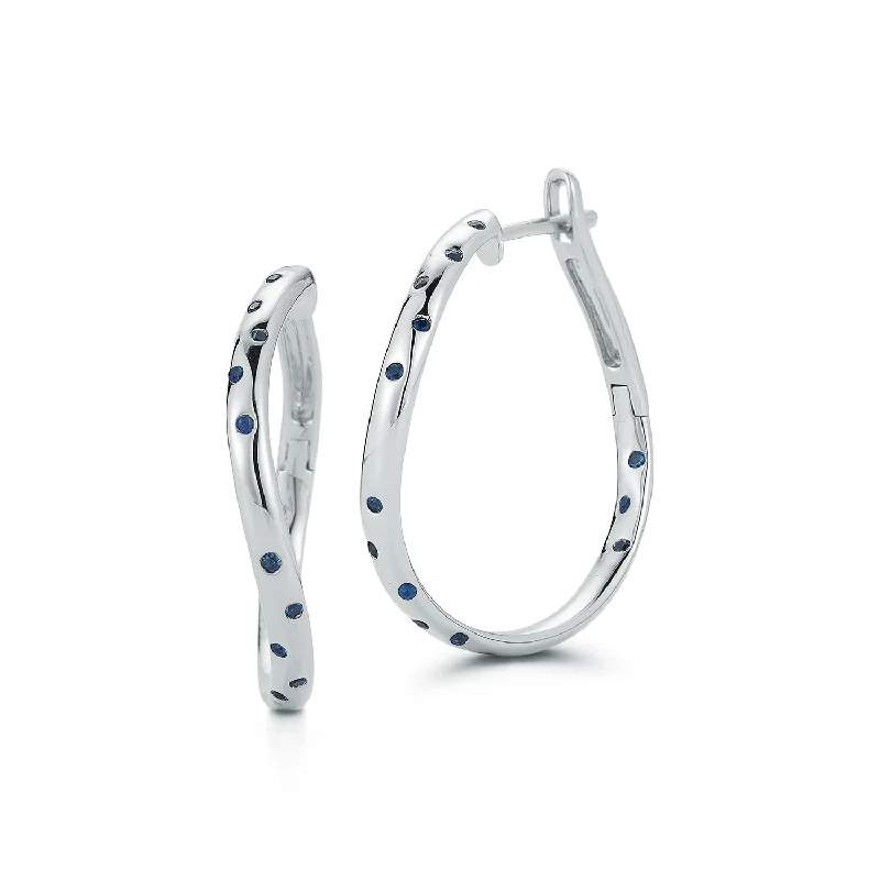 stylish zodiac sign earrings for women -JULIAN 18K WHITE GOLD AND BLUE SAPPHIRE CURVED HOOP EARRINGS